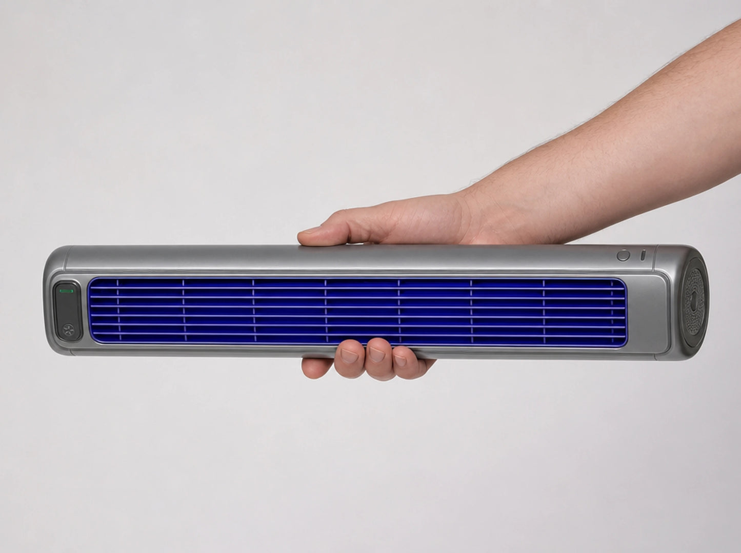 The Froza held in one hand, showing its length