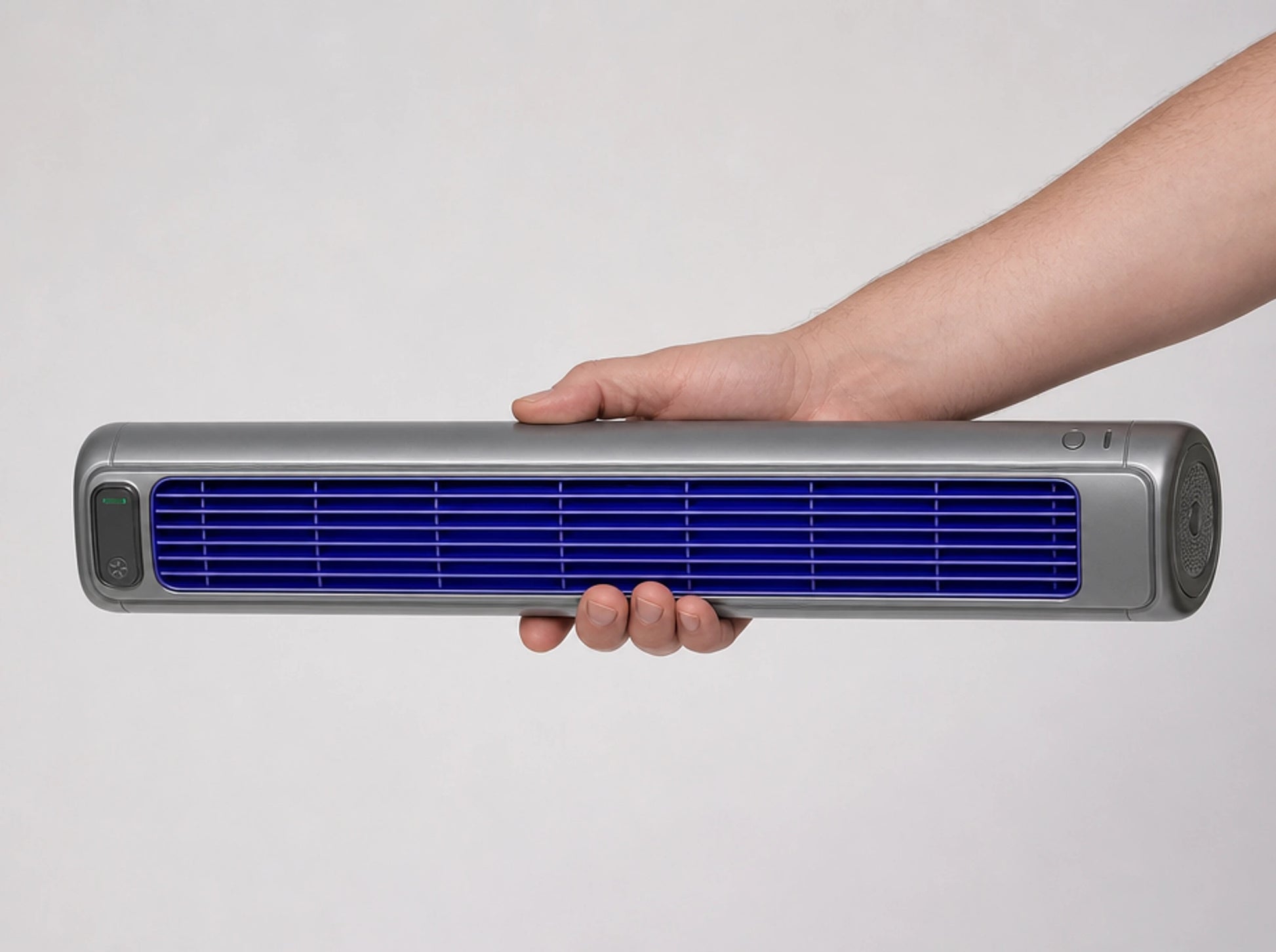 The Froza held in one hand, showing its length