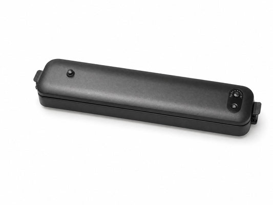 FreshPak vacuum sealer, assembled, on a white background