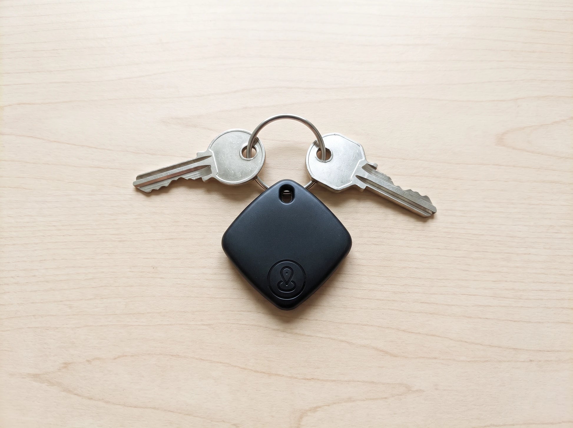 iTagPro on a keyring with house keys