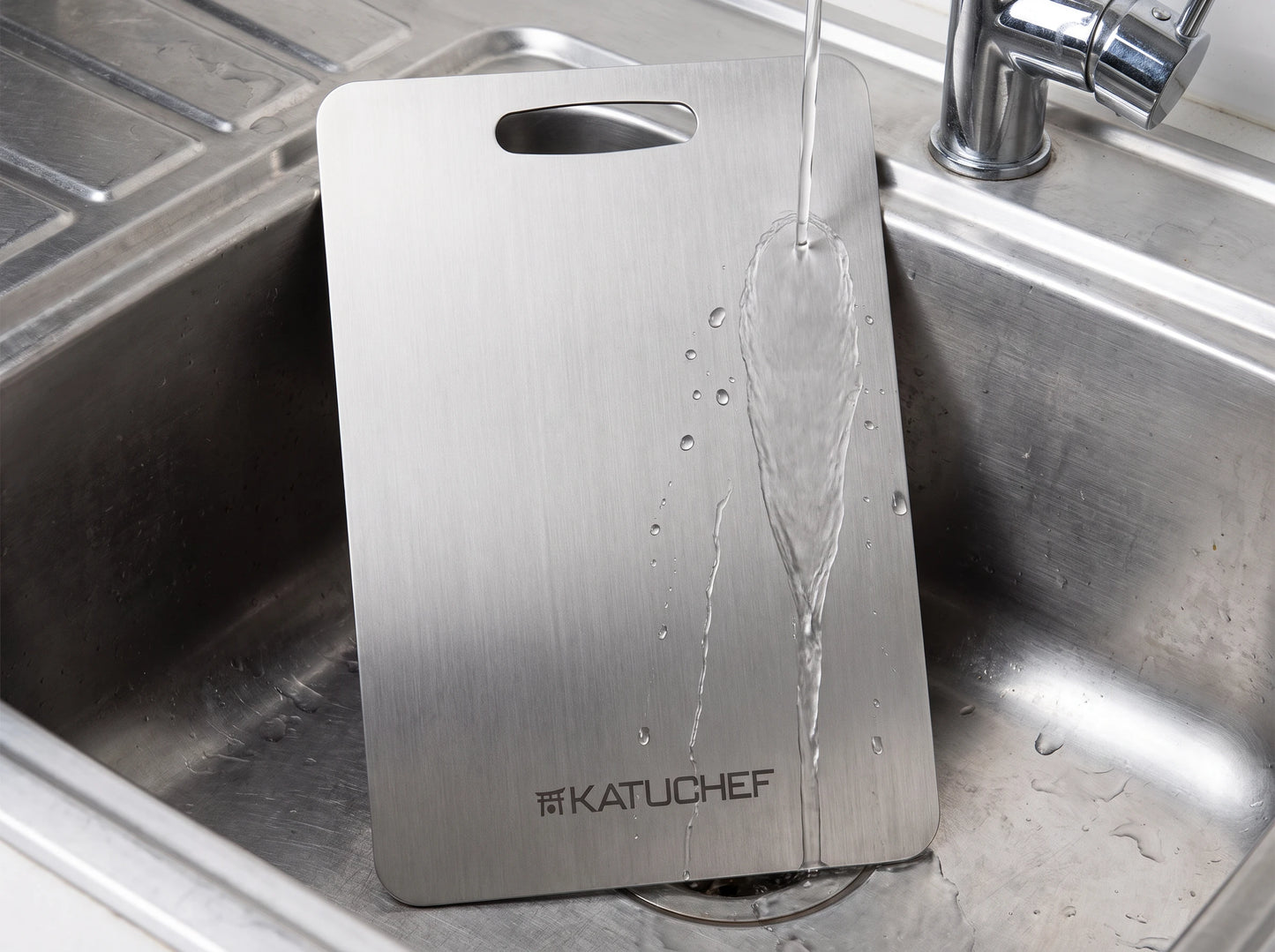 Rinsing the board in the sink