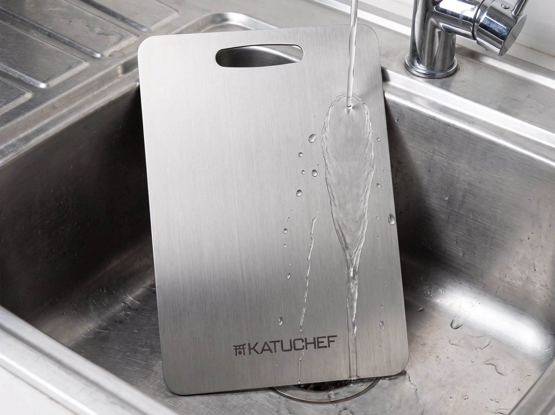 Rinsing the board in the sink