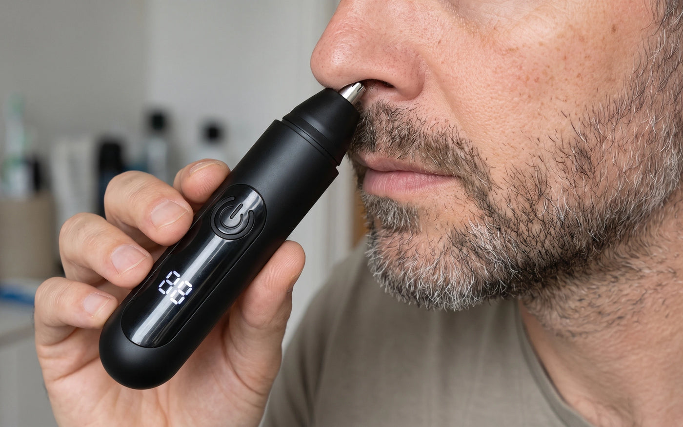 Close view of the rounded tip resting against the outer rim of the nostril